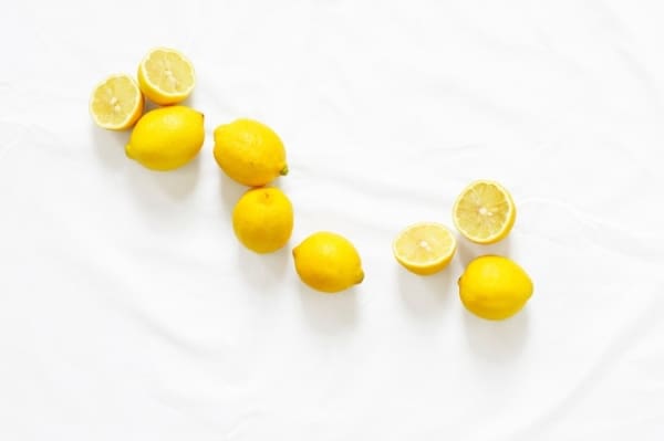Bunch of lemons and lemon halves