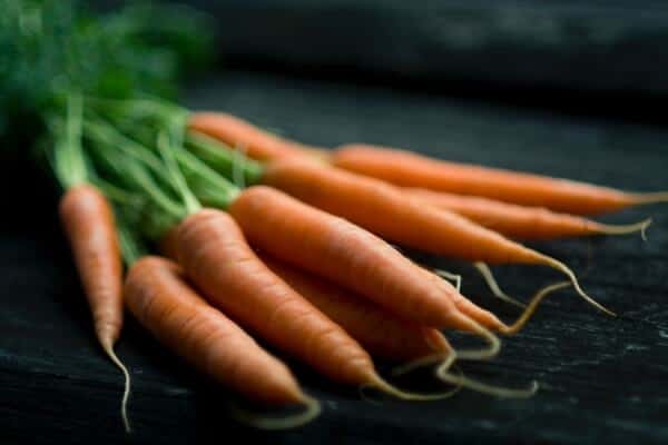 Fresh carrots on table