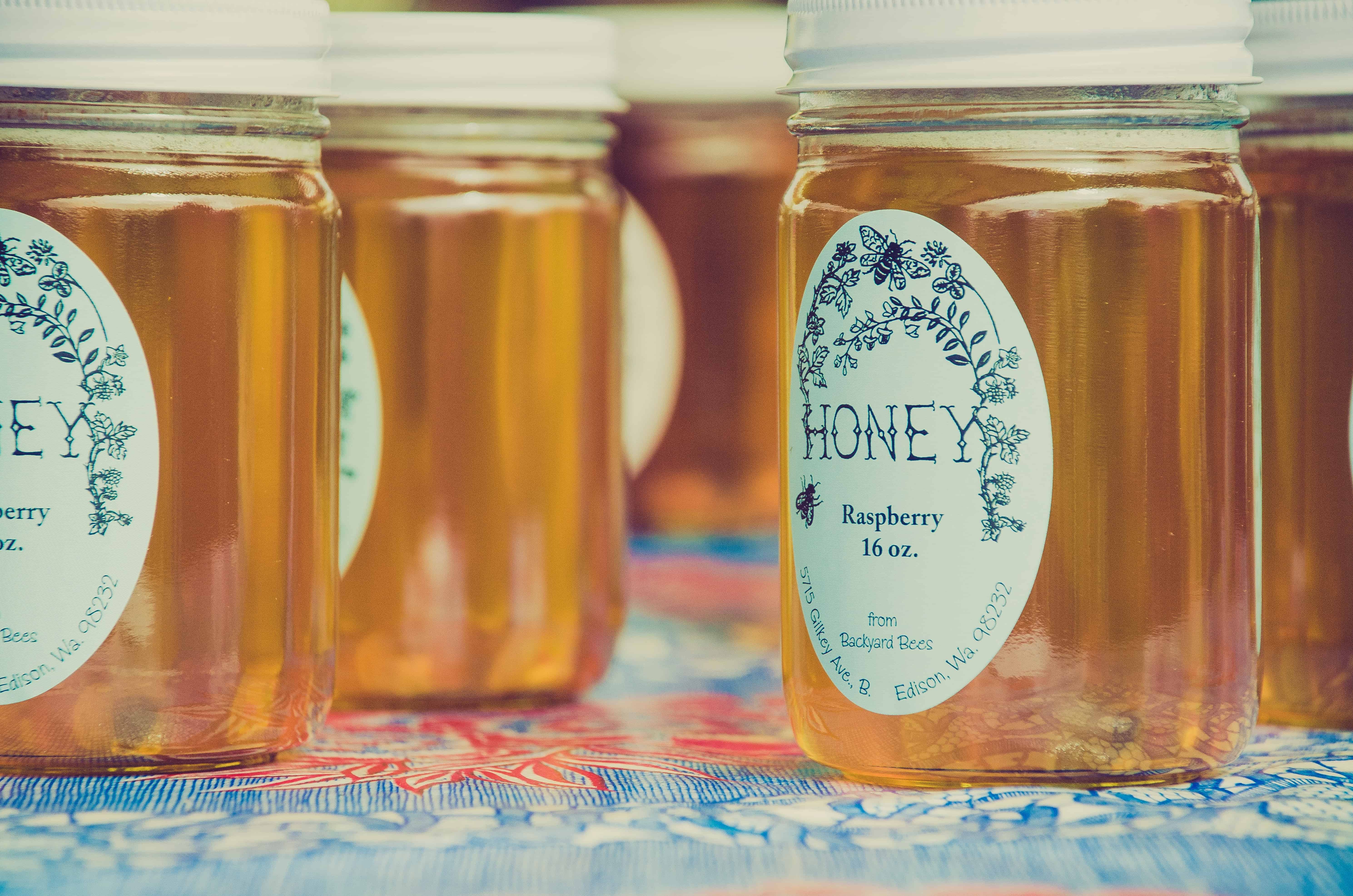 Jars of raspberry honey