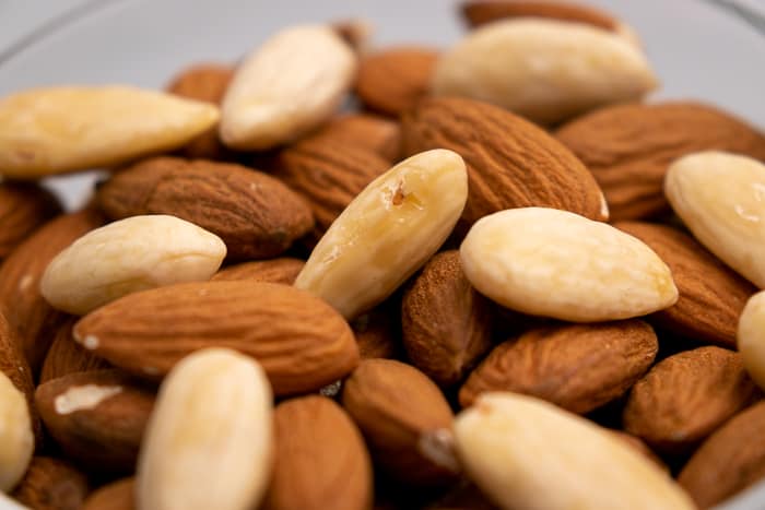 Almonds in a glass bowl closeup