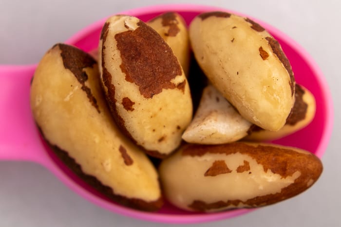 Brazil nuts on a teaspoon